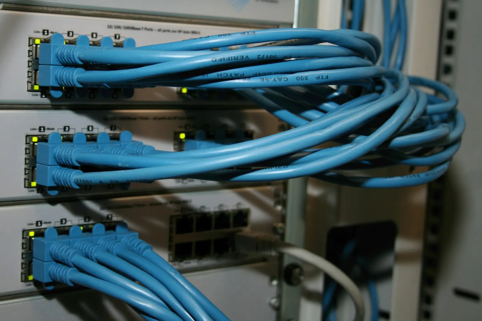 Network switch with blue patch cables