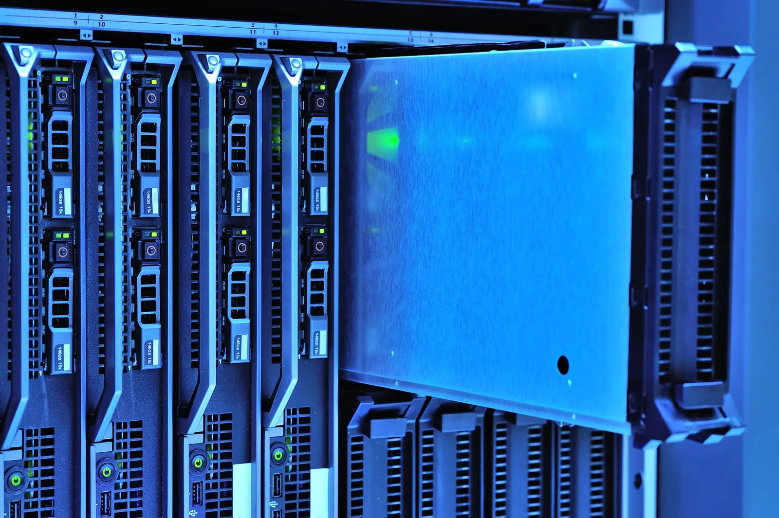Servers with blue indicator lights in a data center